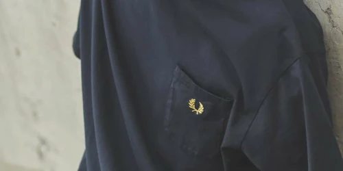 JOURNAL STANDARD から FRED PERRY の別注ポケットTシャツが発売