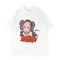 Travis Scott × KAWS の Utopia Tee が発売