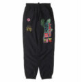 Travis Scott × McDonald's の All American 92 Nylon Pants が発売