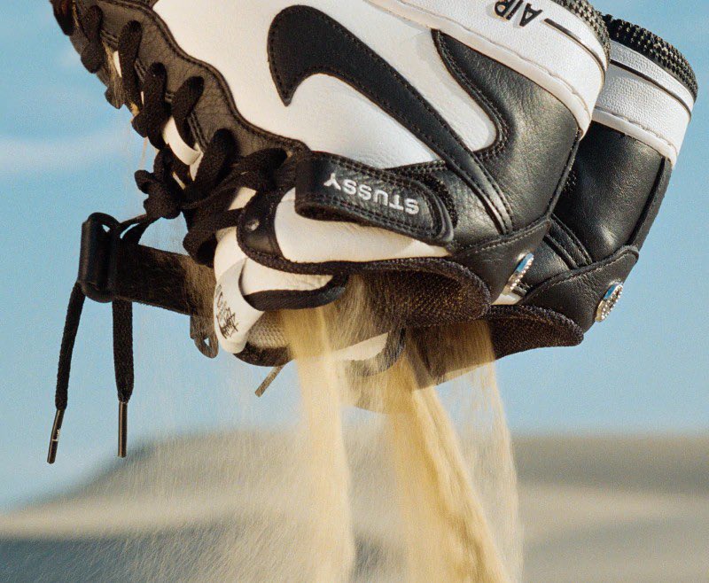 Stüssy × NIKE の AIR FORCE 1 MID "Black/Light Bone" が発売