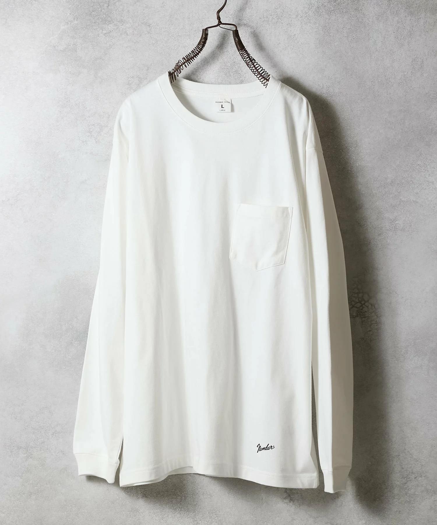 NUMBER (N)INE の Basic Hem Printed Pocket L/S Tee が発売