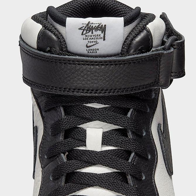 Stüssy × NIKE の AIR FORCE 1 MID "Black/Light Bone" が発売